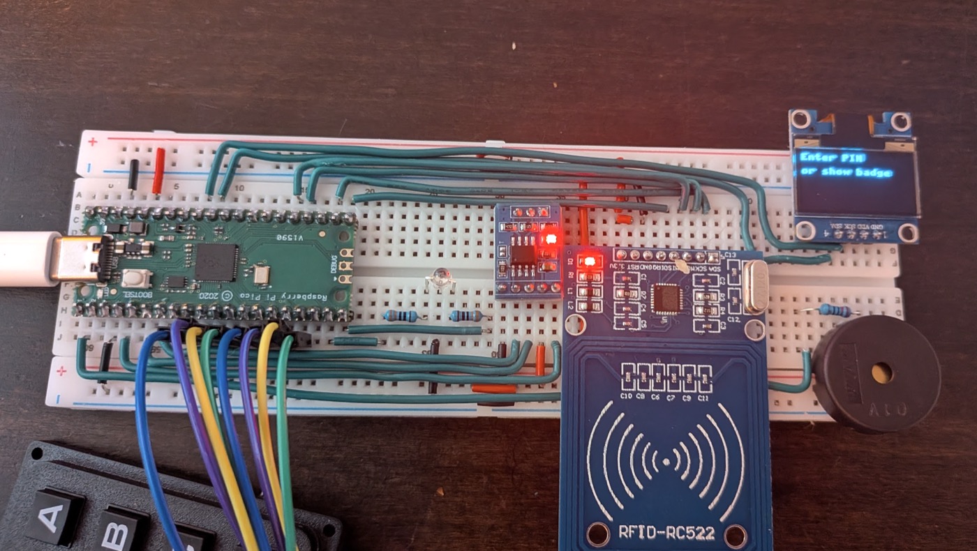 The finished reader: Pico, bicolor LED, MAX3485, RC522, buzzer and OLED screen planted on one breadboard, the keypad on its cable, the screen showing "Enter PIN or show badge"